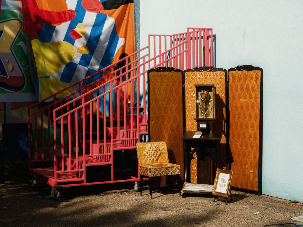 a sculpture/installation is displayed in an urban setting